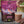 Ett glas med färdigblandad chokladdryck från Moonvalley Post-Workout Mix rörs om med en sked.