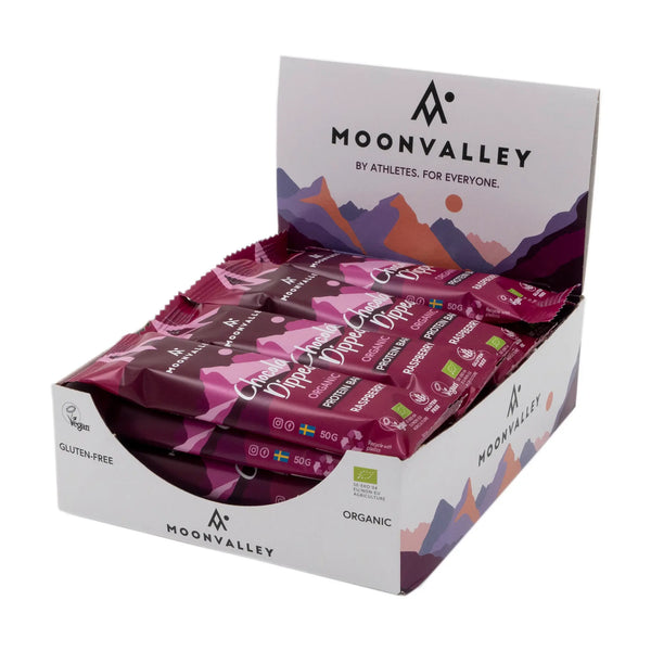 Displaylåda med Moonvalley proteinbars choklad och hallon.