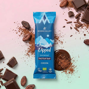 Moonvalley vegansk proteinbar med chokladöverdrag och kakaosmak, 12-pack.