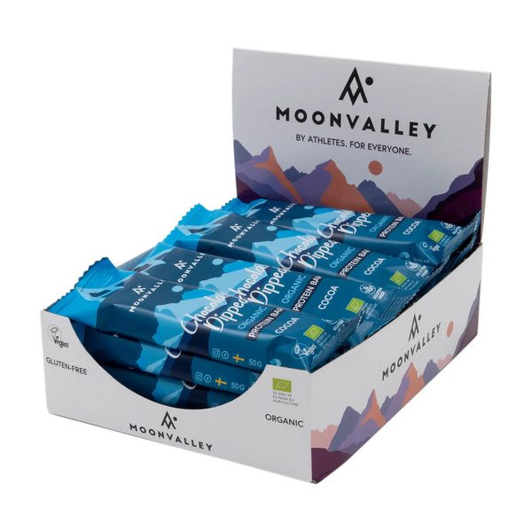 Displaylåda med Moonvalley proteinbars choklad och kakao.