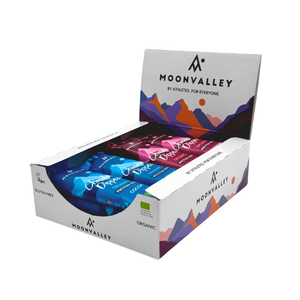 Displaylåda med 12-pack Moonvalley proteinbars i mixade smaker.