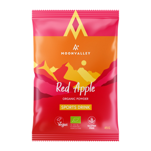 En påse Moonvalley ekologisk sportdryck med smak av rött äpple.