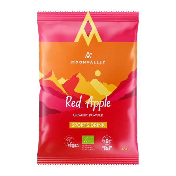 En påse Moonvalley ekologisk sportdryck med smak av rött äpple.